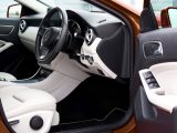 Experience the luxury and modern design of this high-end car interior showcasing premium leather and sleek details.