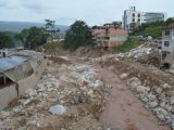 Destruction in Mocoa, Colombia due to a severe mudslide with debris and damaged buildings.
