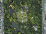 Aerial shot of St. Stephen's Green park in Dublin, showcasing lush gardens and adjacent cityscape.