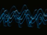 a black background with a blue wave of light