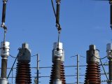 a group of towers with wires