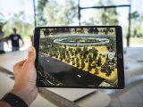 person holding black iPad