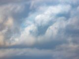 A peaceful cloudy sky with soft light and textures, perfect for weather and nature themes.